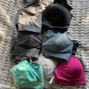 Lot of 7 sports bras sz large/38d/dd UNDER ARMOUR REEBOK CHAMPION SPALDING ETC
